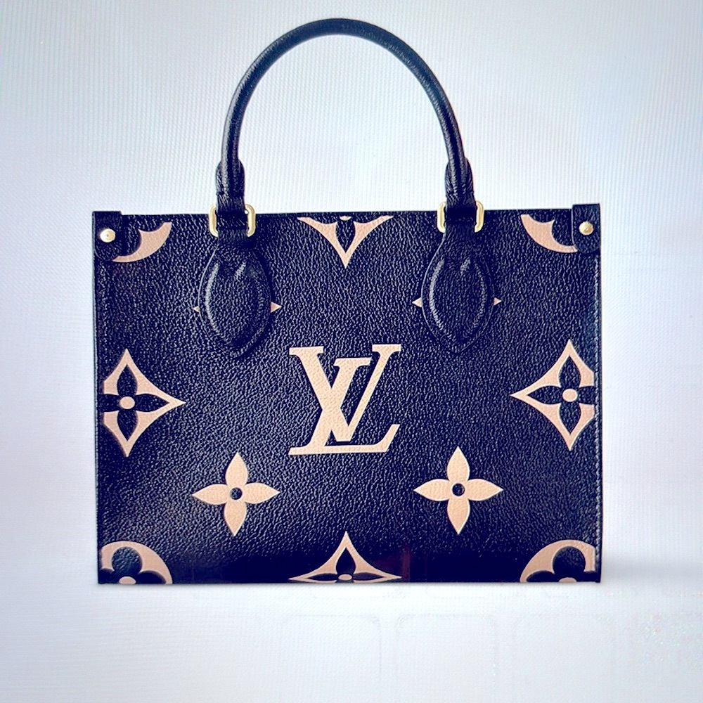 Louis Vuitton OnTheGo PM. Bicolor Monogram Empreinte leather.